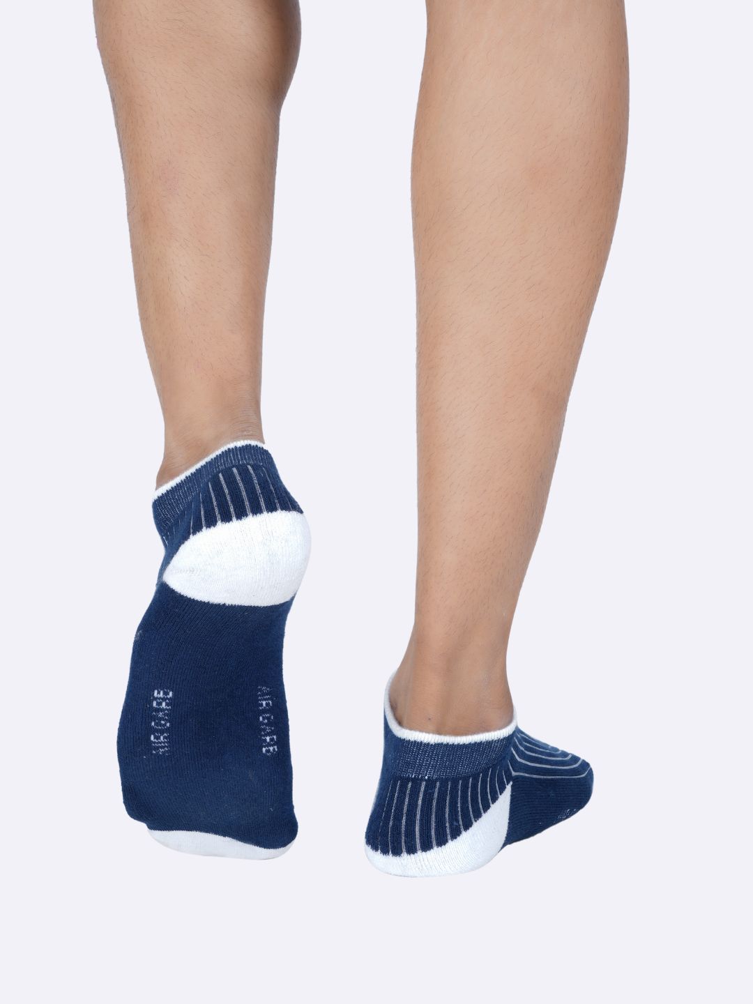 Stretchable ribbed ankle socks offering a snug and secure fit.